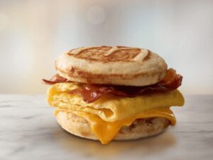 A high-protein breakfast sandwich with bacon and cheese at McDonald's.