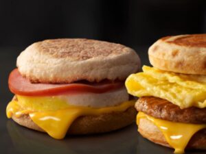 High protein McDonald's breakfast sandwiches on a black surface.