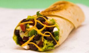 A budget-friendly burrito featuring black beans, lettuce, and cheese.