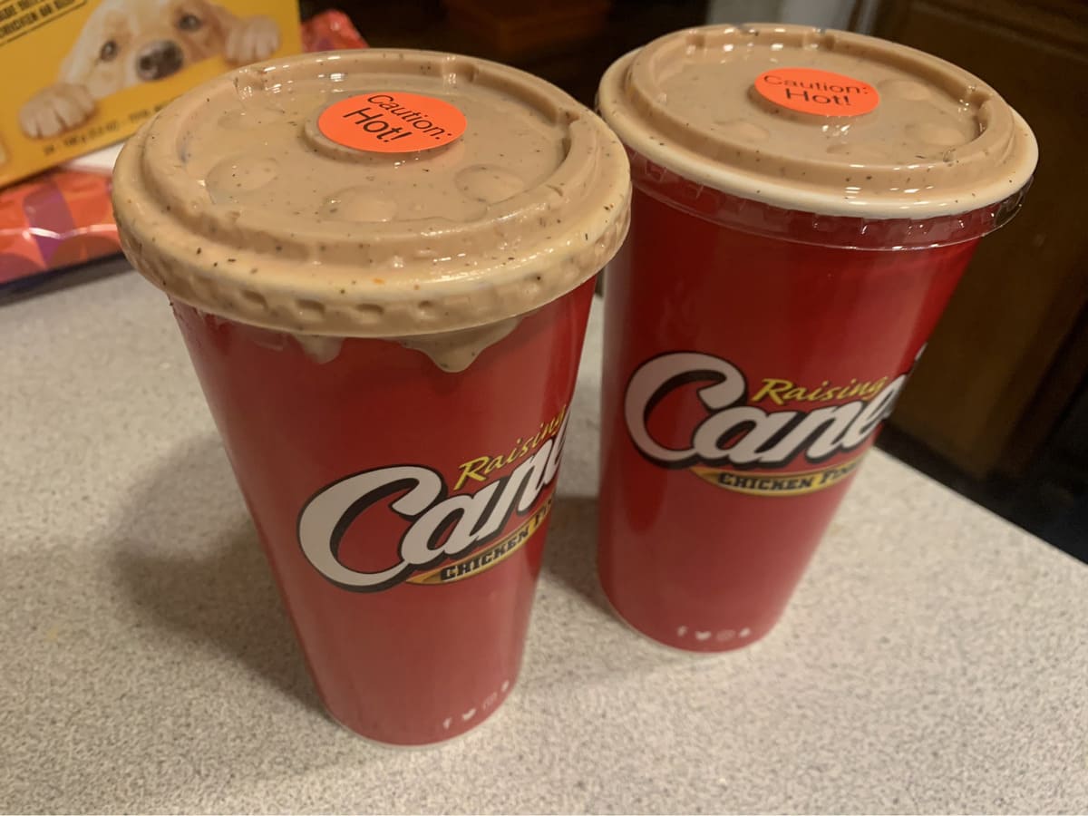 Two cups of campfire ice cream on a counter, featuring a secret menu item from Raising Cane's.