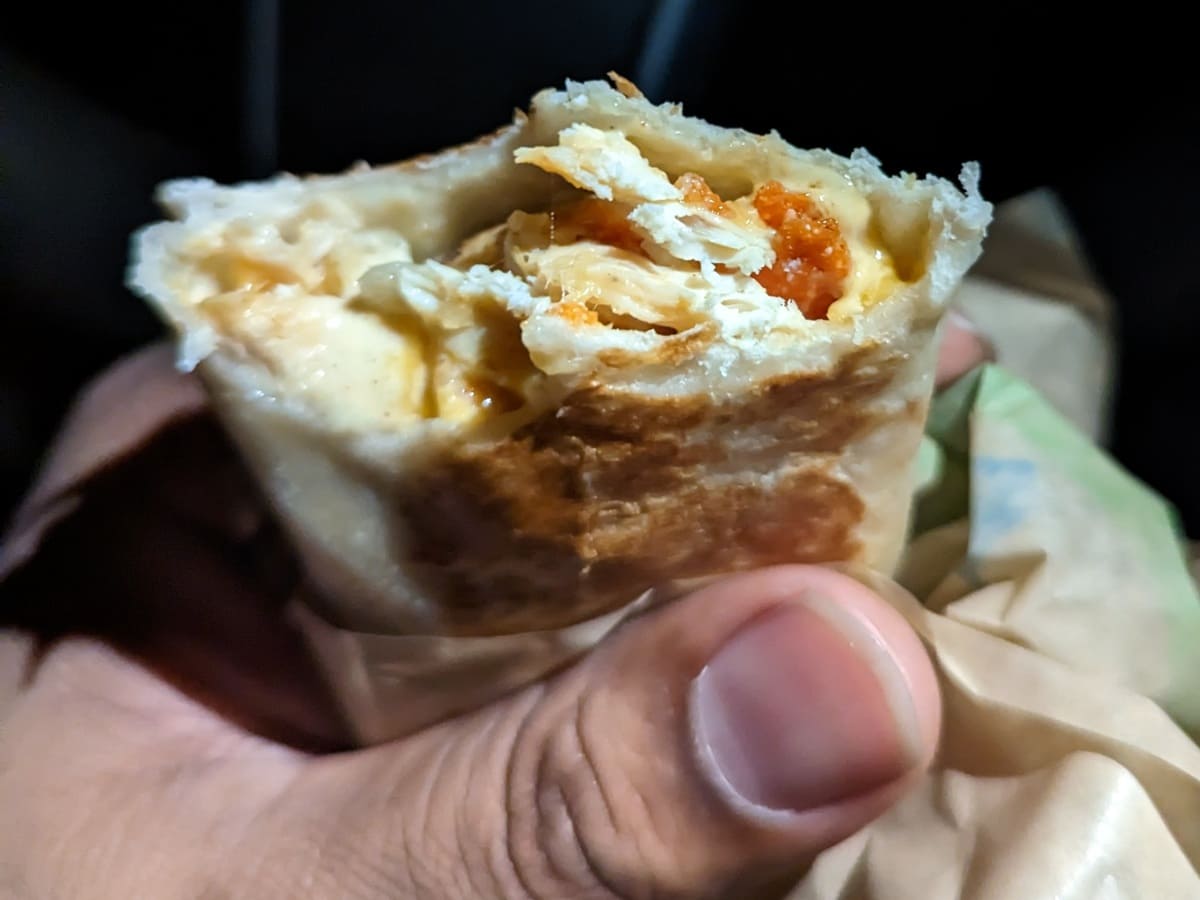 https://www.fastfoodmenuprices.com/wp-content/uploads/2023/10/Grande-Toasted-Burrito-2.jpg